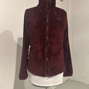 The North Face zip up fleece magnets black lettering zip up pockets and inside